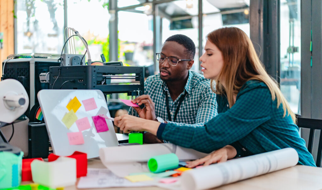two business people working on products in an office environment