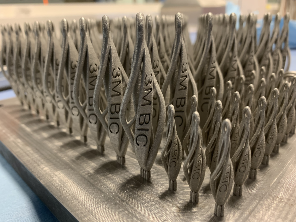 Small batch production of SLM printed keyrings.